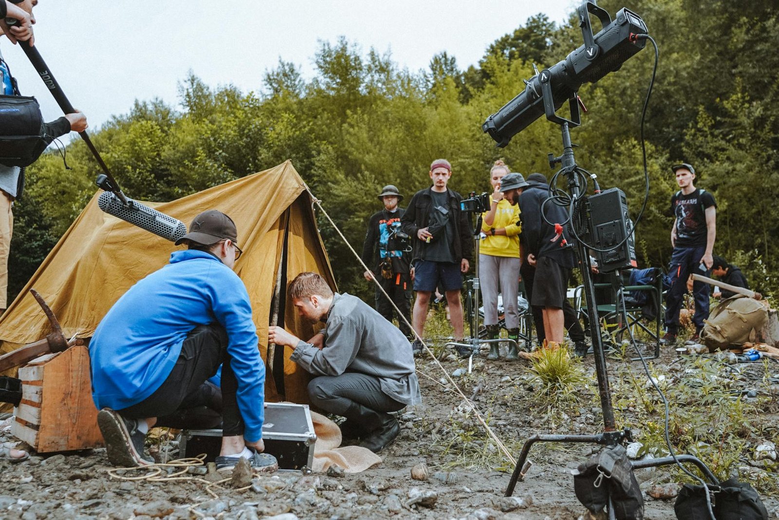 actors and the film crew filming in mountains